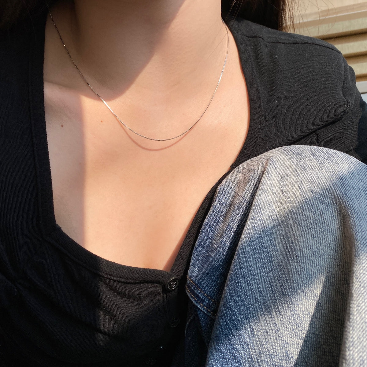 925 sterling silver Box Chain Necklace, styled on model 2
