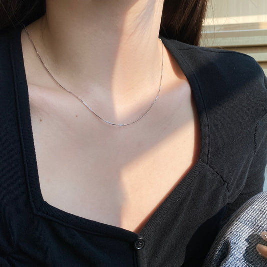 Box Chain Necklace in silver finish, styled on model