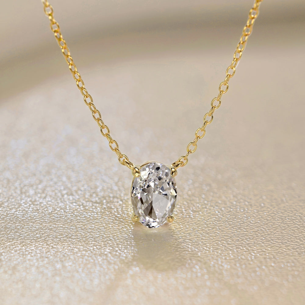 18K gold-plated 925 sterling silver Oval Solitaire Pendant Necklace with oval-cut cubic zirconia, close-up detail