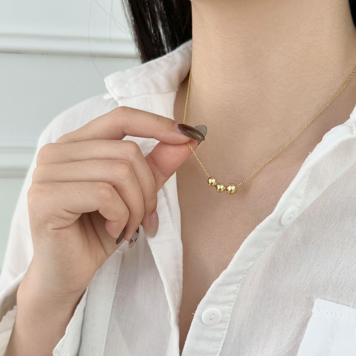 Collar de Tres Esferas